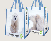 Two polar bear grocery tote bags with blue handles